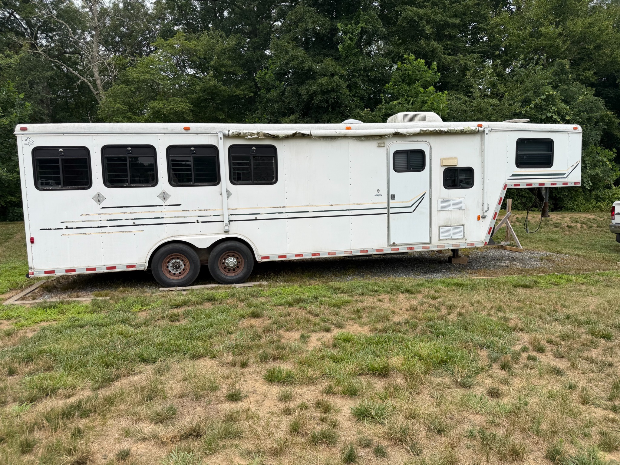 Scott's 36-foot four-horse trailer in Oakdale before the exterior 1-step gel-coat polish
